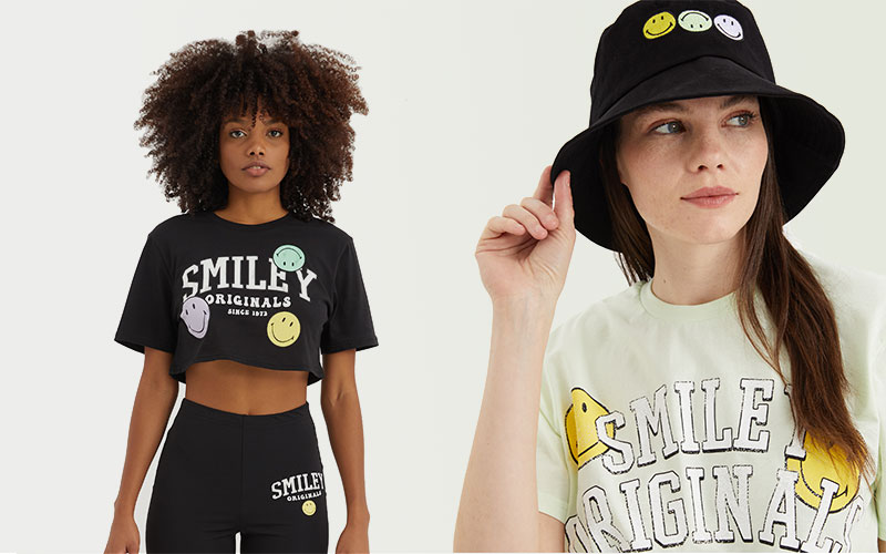 Two models wearing Smiley products